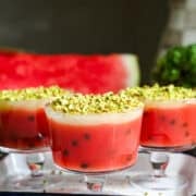 Front view of watermelon pudding in a dessert cup.
