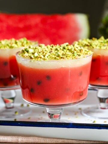 Front view of watermelon pudding in a dessert cup.