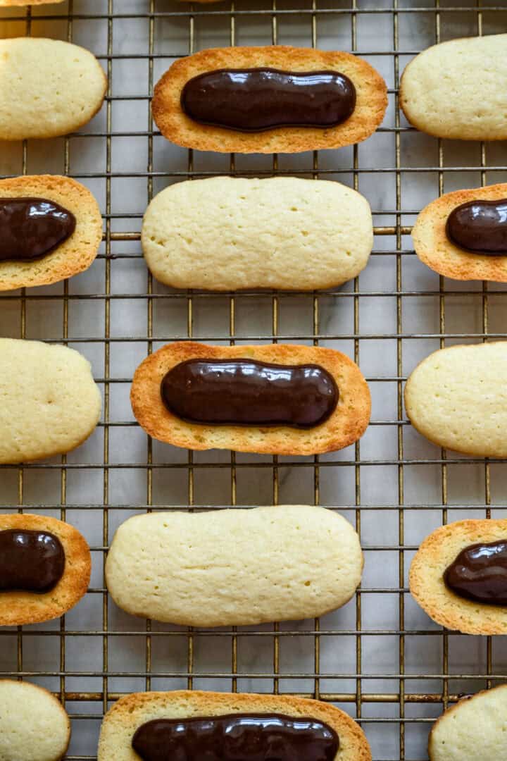 chocolate piped onto half of the milano cookies.