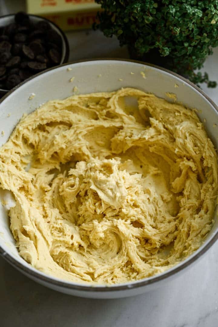 Milano cookie dough in a white mixing bowl.