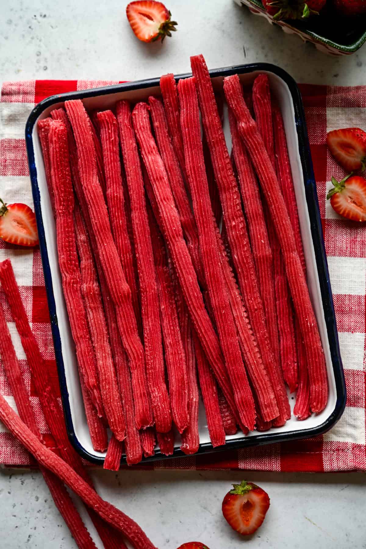 Overhead view of twizzlers on a tray.