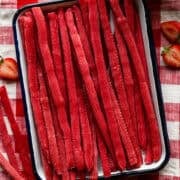 Overhead view of twizzlers on a tray.
