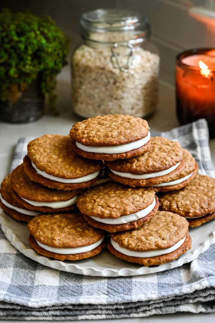 Front view of oatmeal cream pies on a plate.