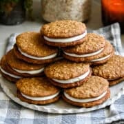 Front view of oatmeal cream pies on a plate.
